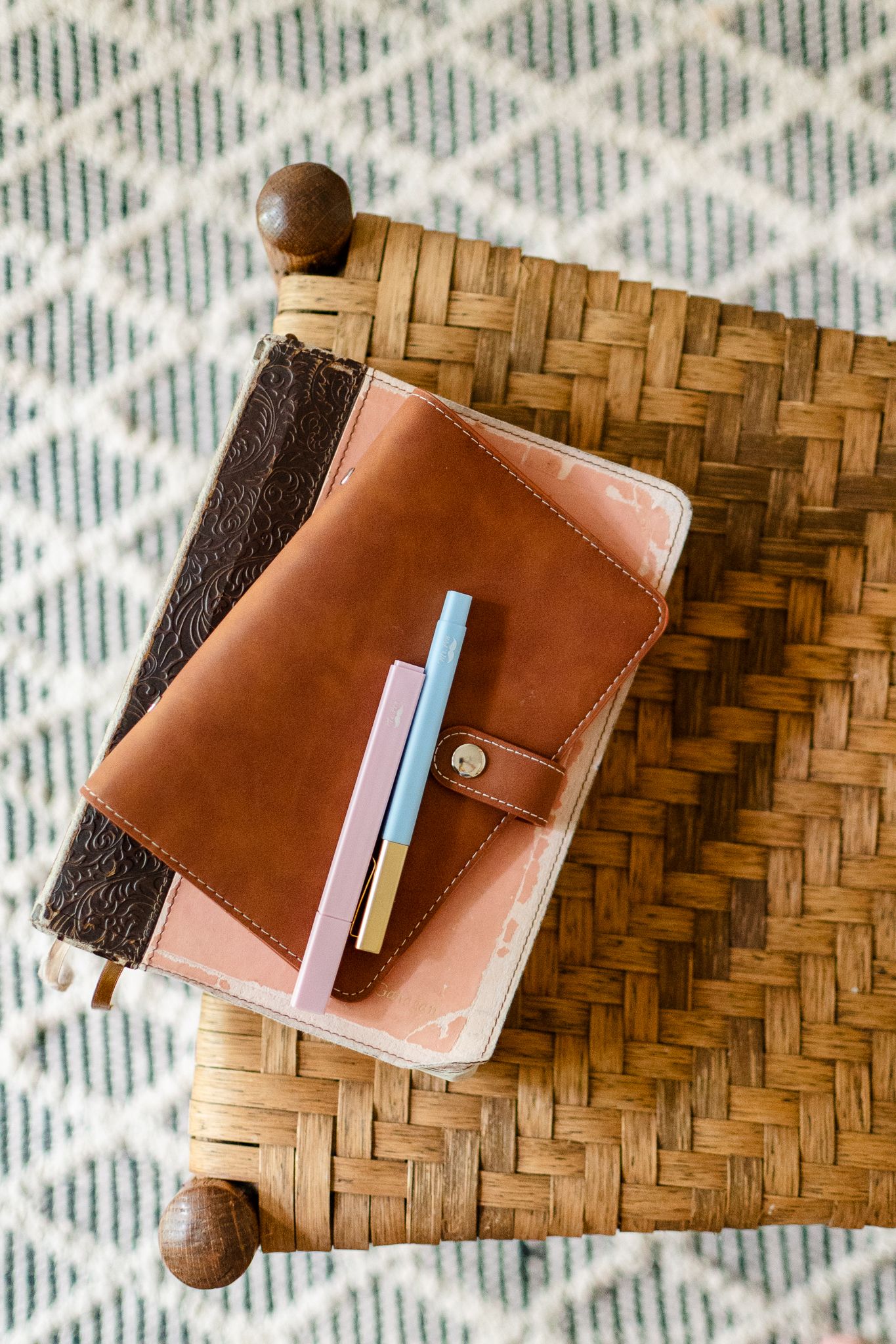 A Bible, journal, and pens are all important things to this online ministry worker during her personal brand shoot.