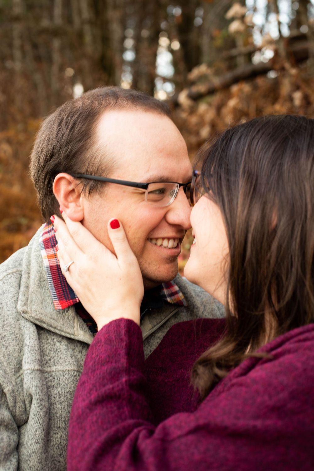 A series of intimate close-up moments between a couple during their fall engagement shoot.