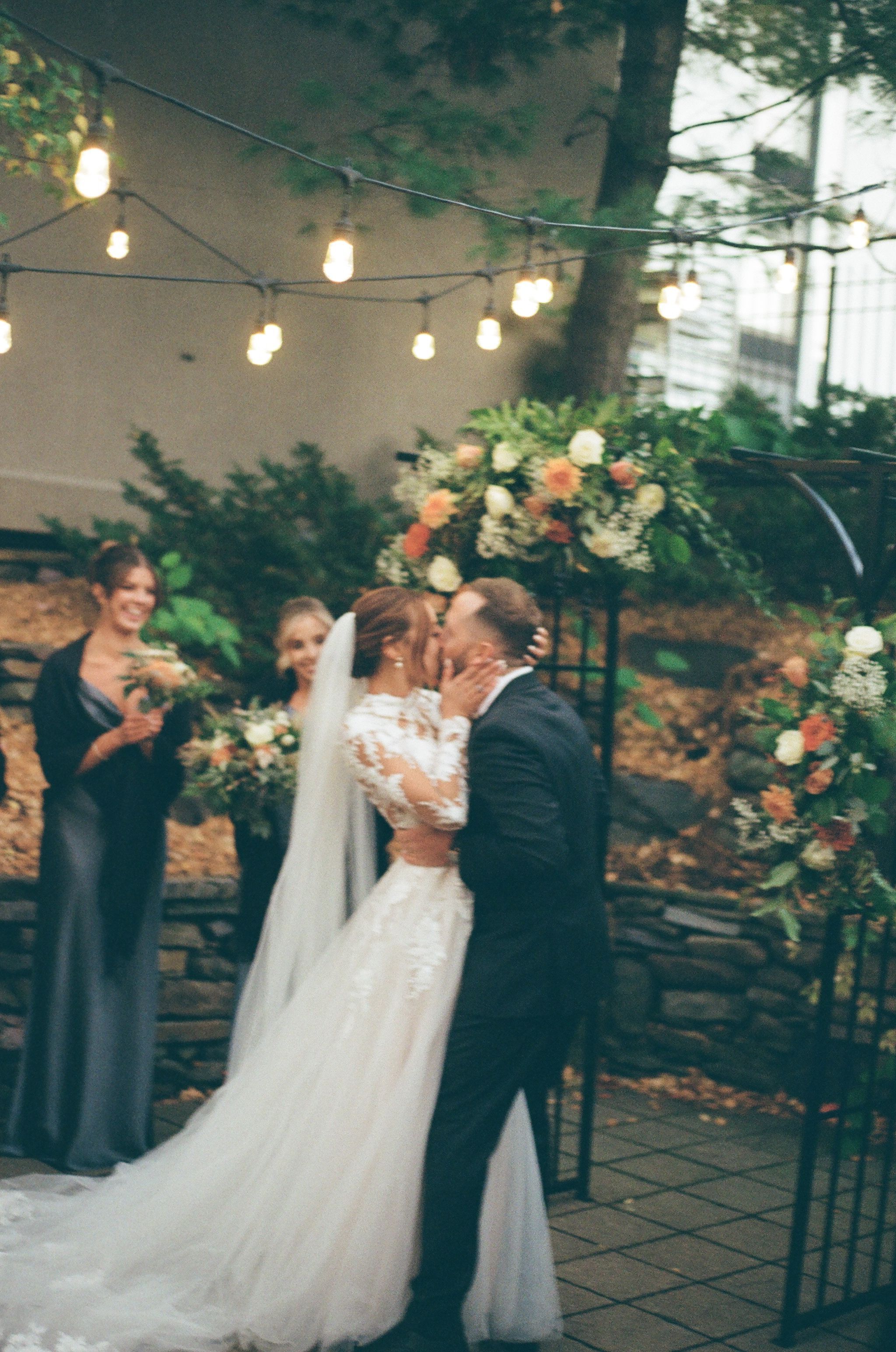 The first kiss between bride and groom captured on film