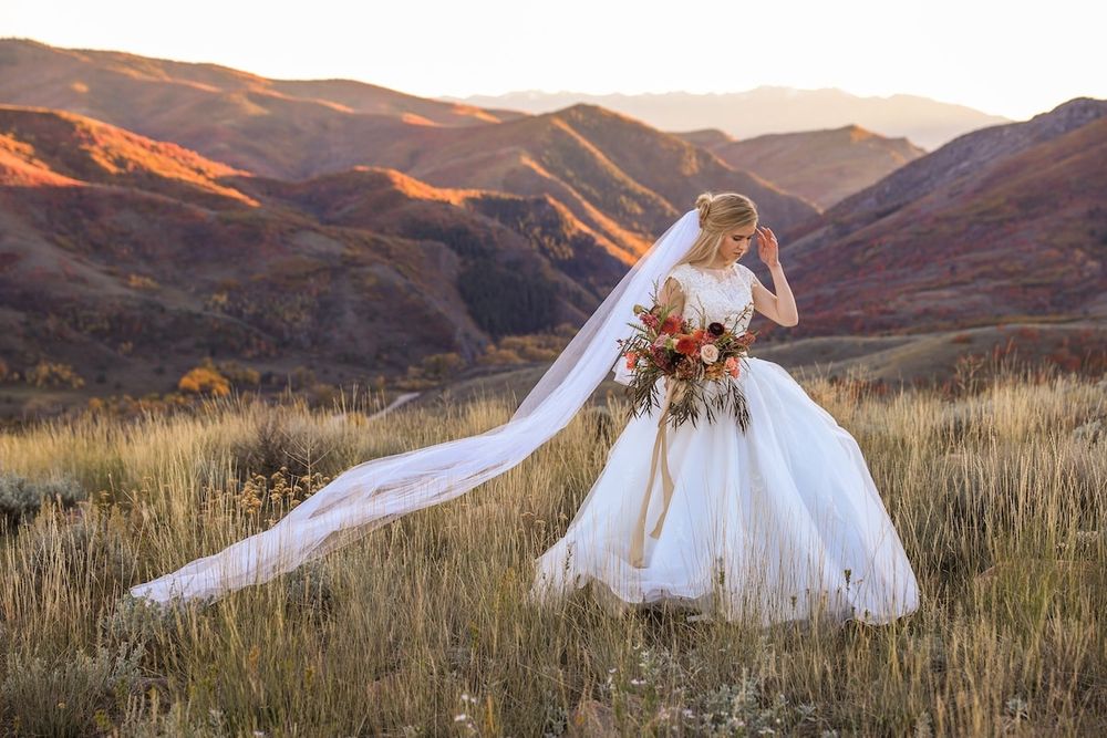 beautiful flowing wedding dress in a fall