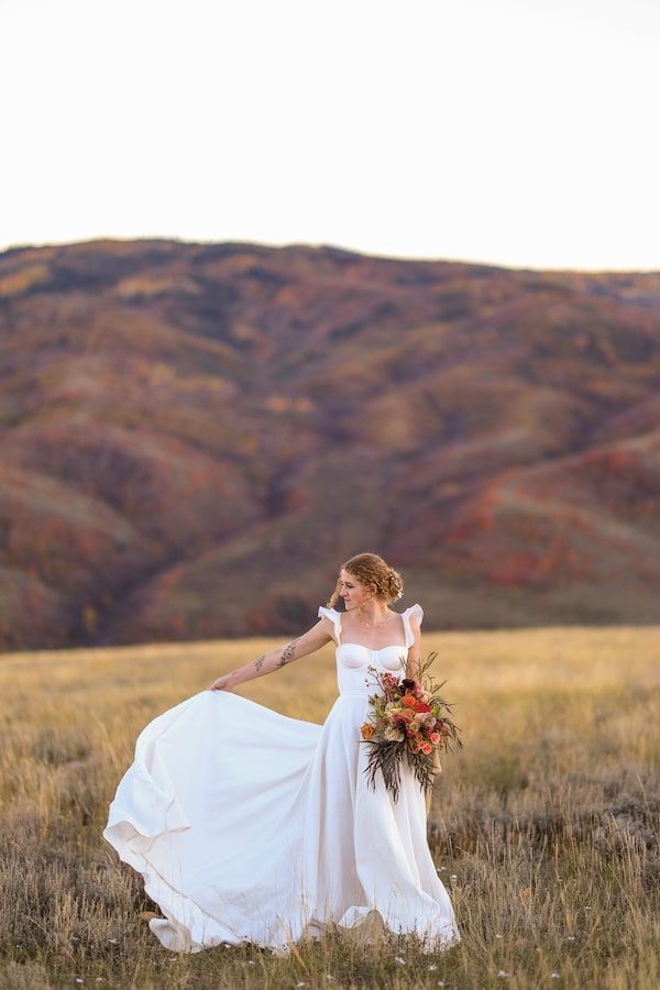 flowing dress in a mountain setting