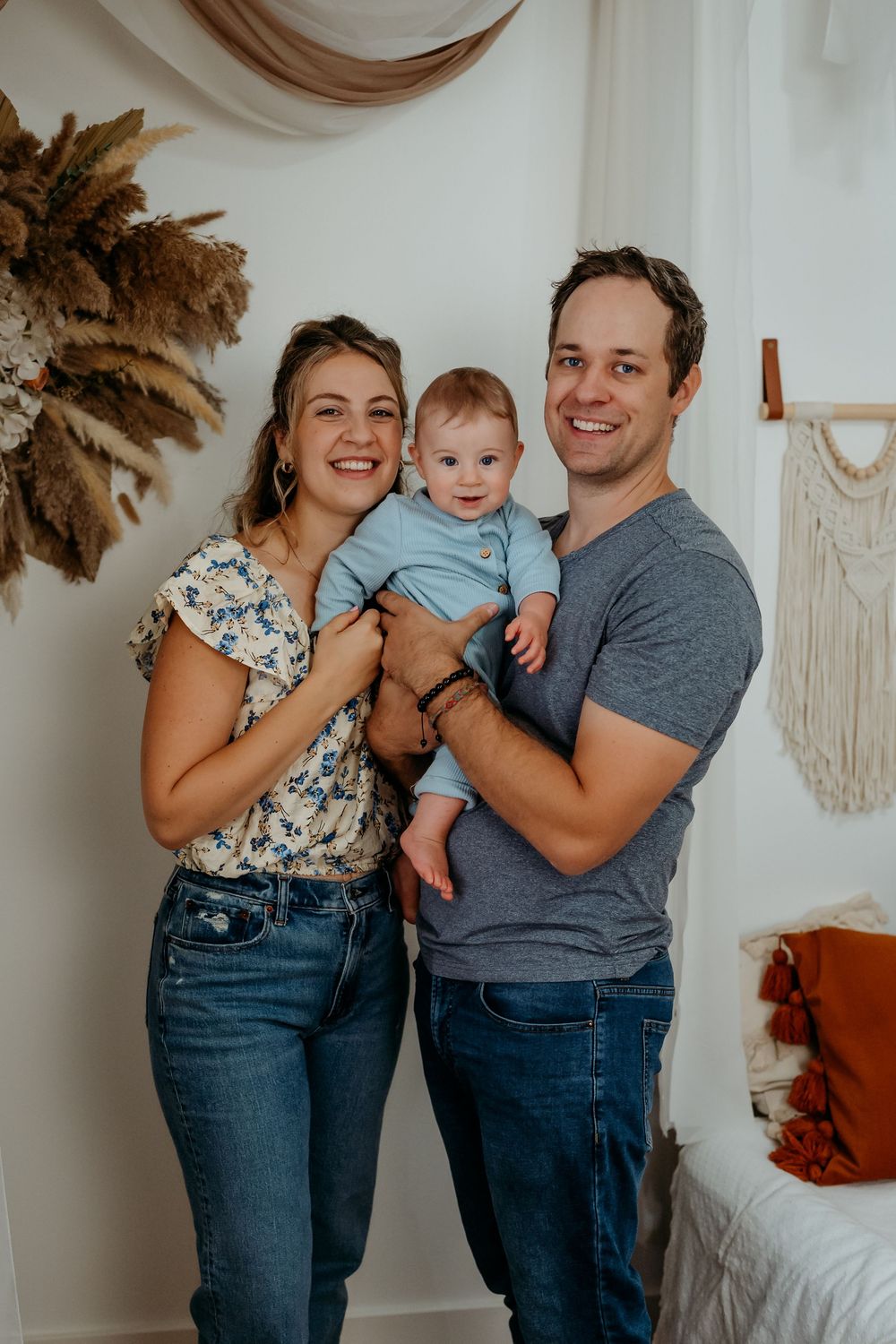 Loving family photo series showing playful interactions and laughter against neutral backdrop with macrame decor.