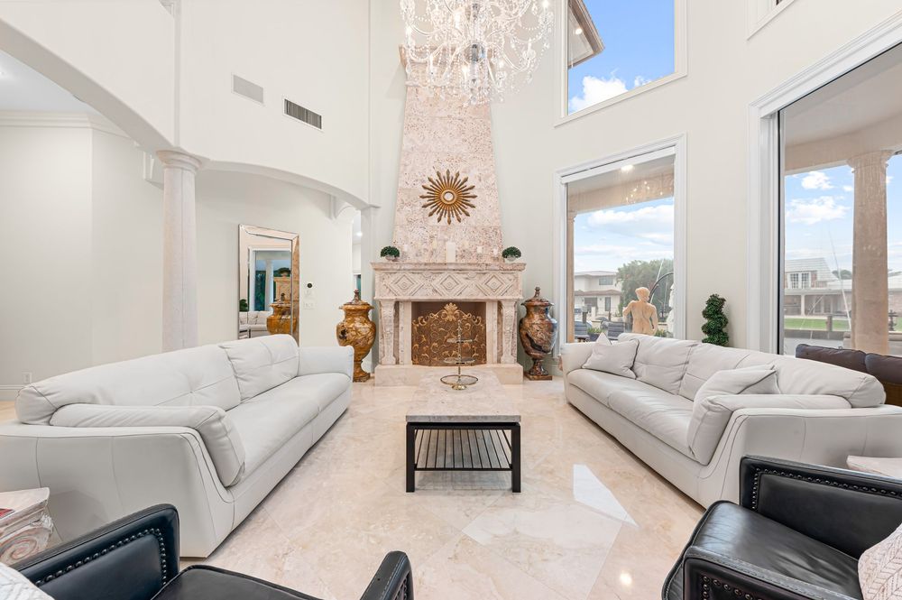 Real estate photography for this luxurious open-concept living and dining area in Fort Lauderdale