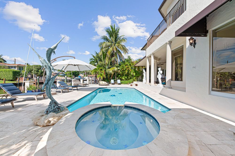Real estate photography for this luxurious open-concept living and dining area in Fort Lauderdale
