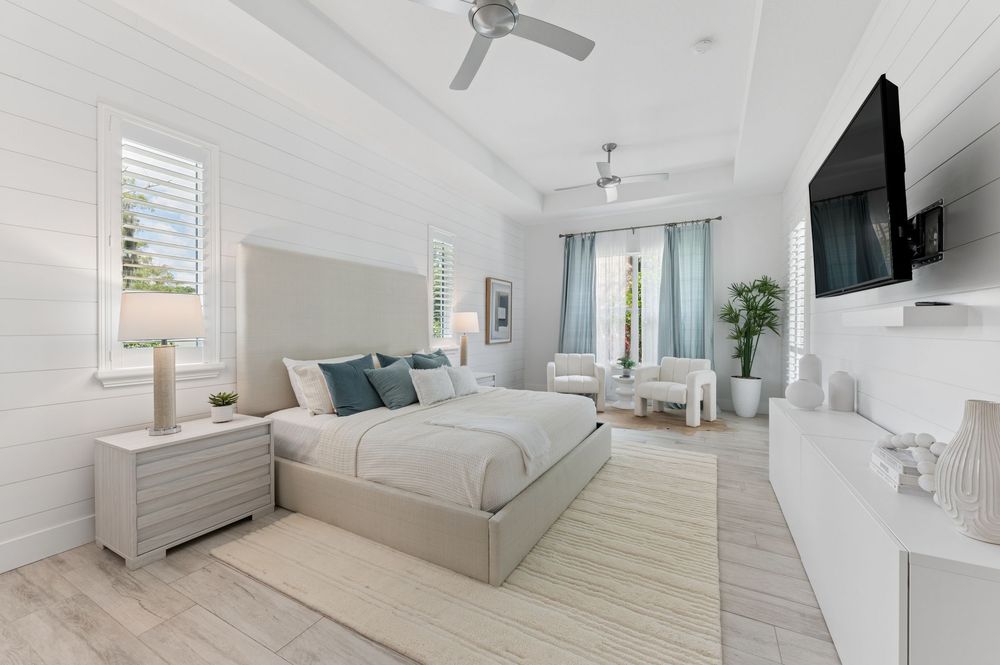 Real estate photography for this luxurious open-concept living and dining area in Palm Beach Gardens Real estate photographer in Palm Beach