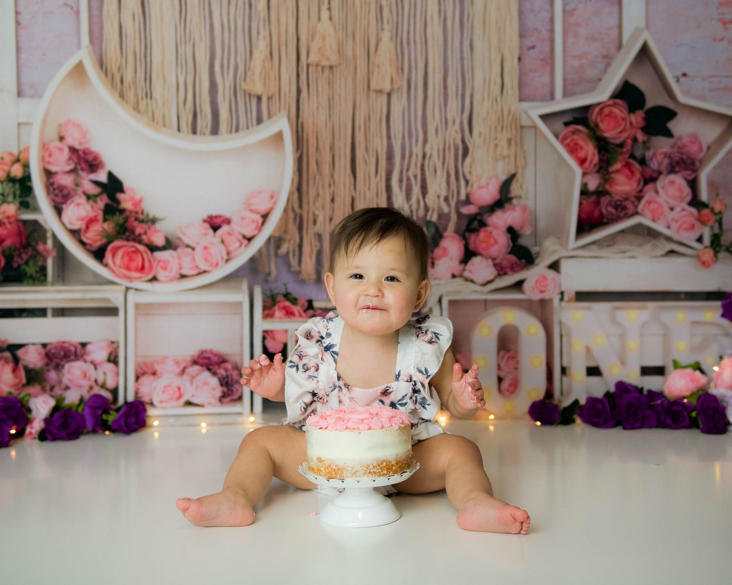 girl eating cake with icing everywhere