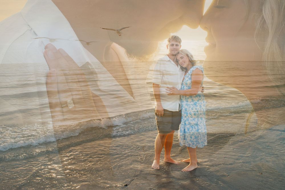 Couple embracing on a beach at sunset with golden light and seagulls in a dreamy double-exposure style photo.