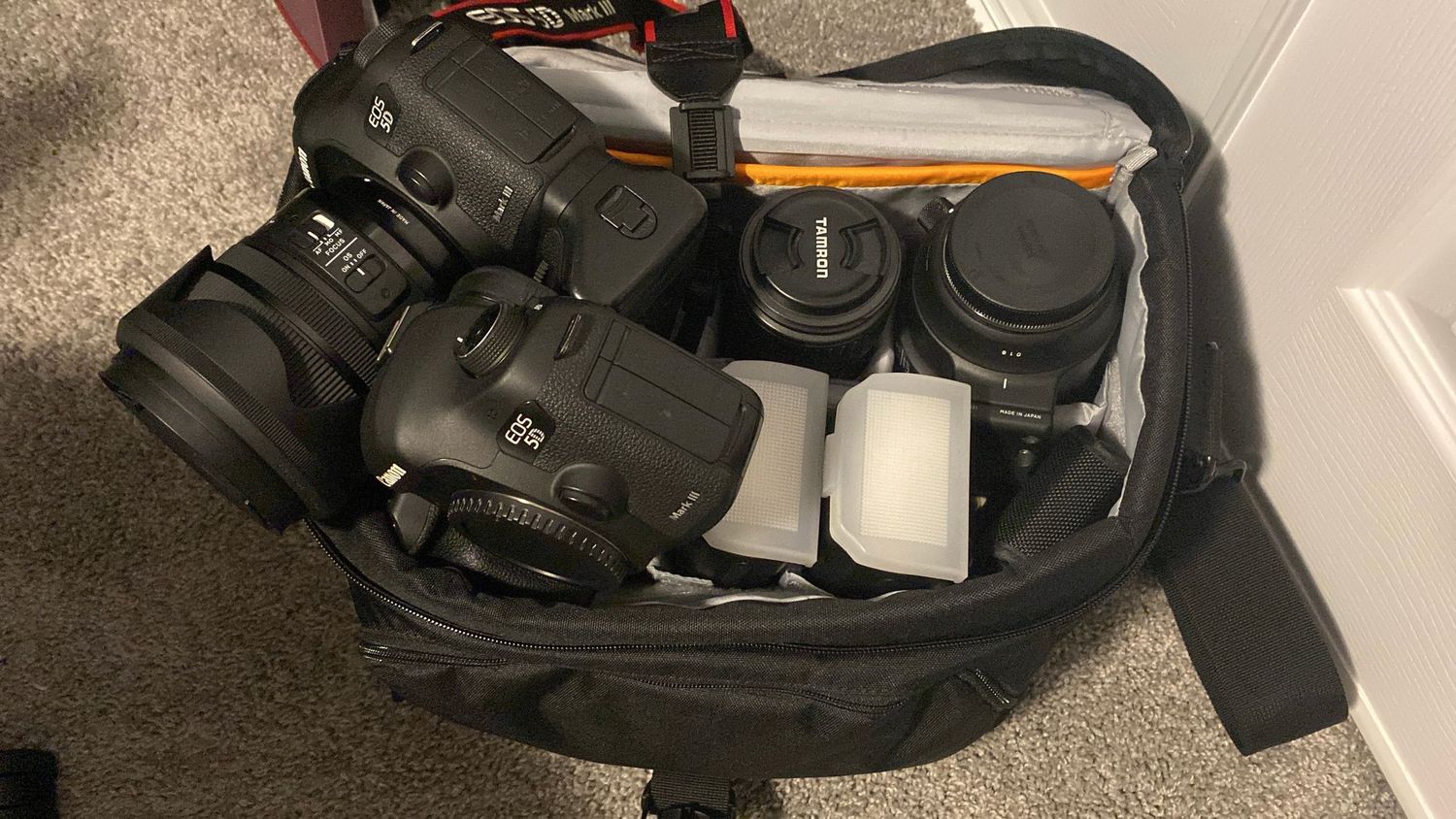 Lowepro Nova 200 AW II camera bag full of gear