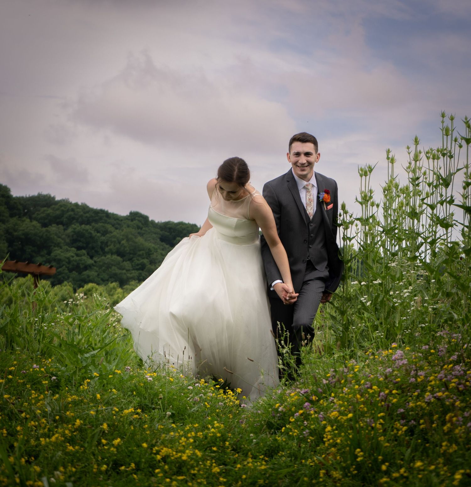 Romantic couple embracing outdoors on their wedding day