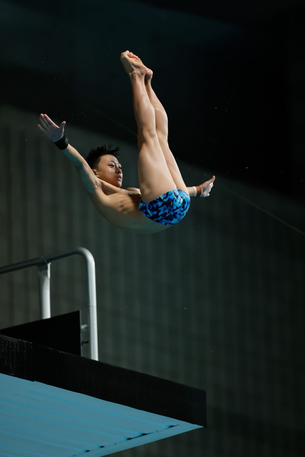 Diving sports action photo taken by Sunshine Coast Sports Photographer, Rachel Wright