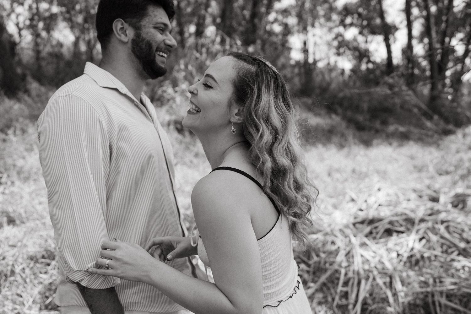 Artistic black and white series capturing romantic couple's candid interactions.