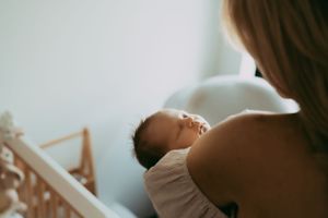 Intimate family photography session in soft natural light.