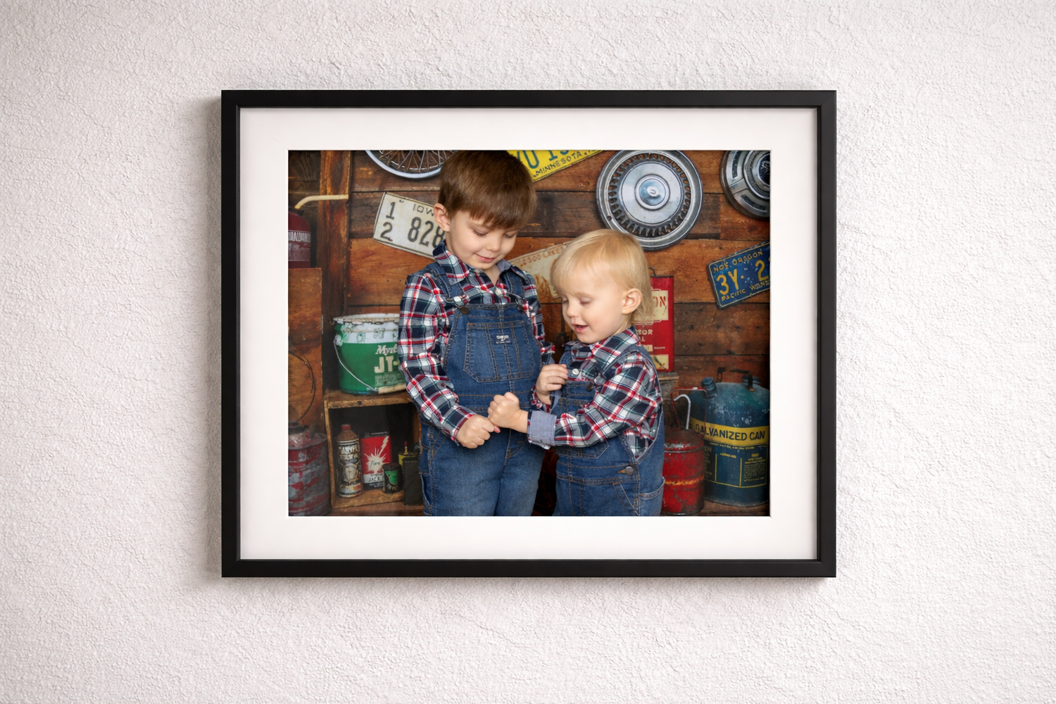 Framed studio portrait ready for client pickup in Miramichi