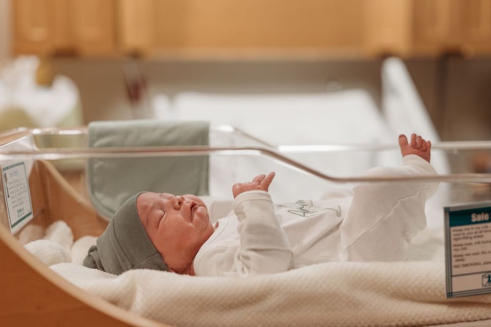 Newborn baby photographed in the hospital during a Fresh 48 session