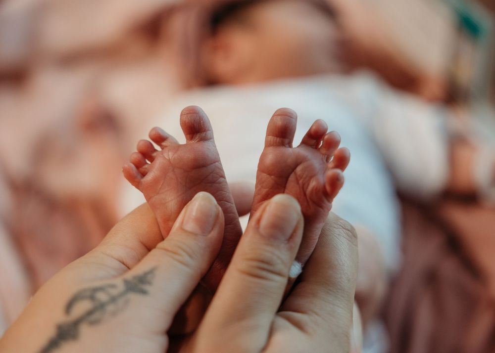 Newborn baby photographed in the hospital during a Fresh 48 session