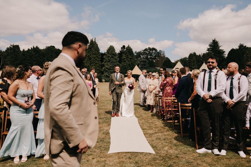A series of outdoor wedding ceremony photos showing guests and wedding party members in formal attire against a sunny landscape.