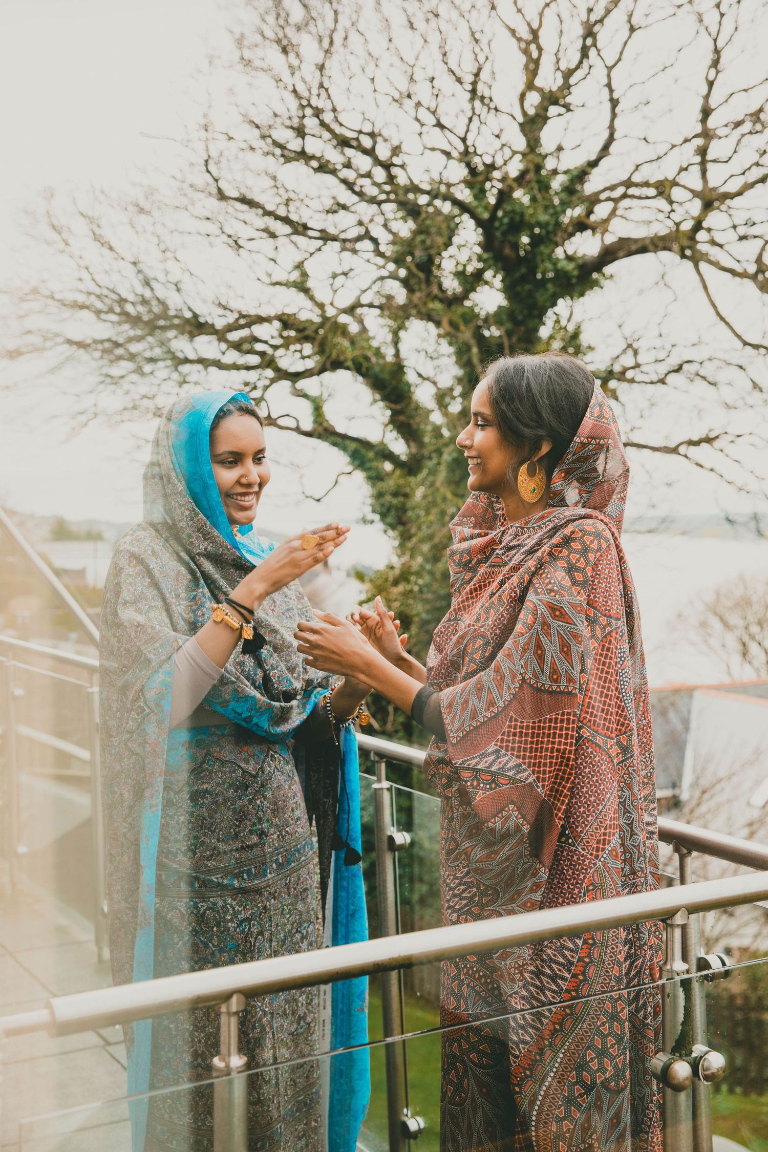 Sudanese/Welsh sisters - wearing silk Toubs designed by HIMA RAHAMA. NORTH WALES