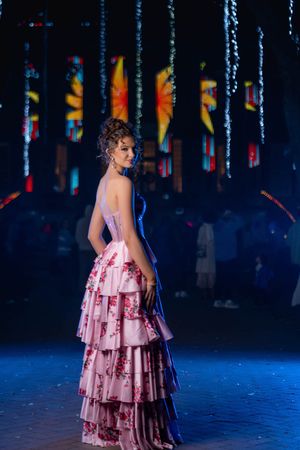 Charleston prom portrait of high school senior wearing elegant floral formal gown at night