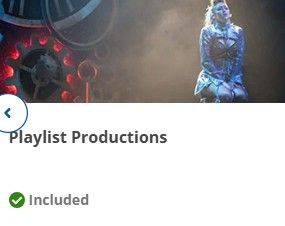 A blue-tinted concert stage with dramatic lighting and fog effects creates an atmospheric performance environment.
