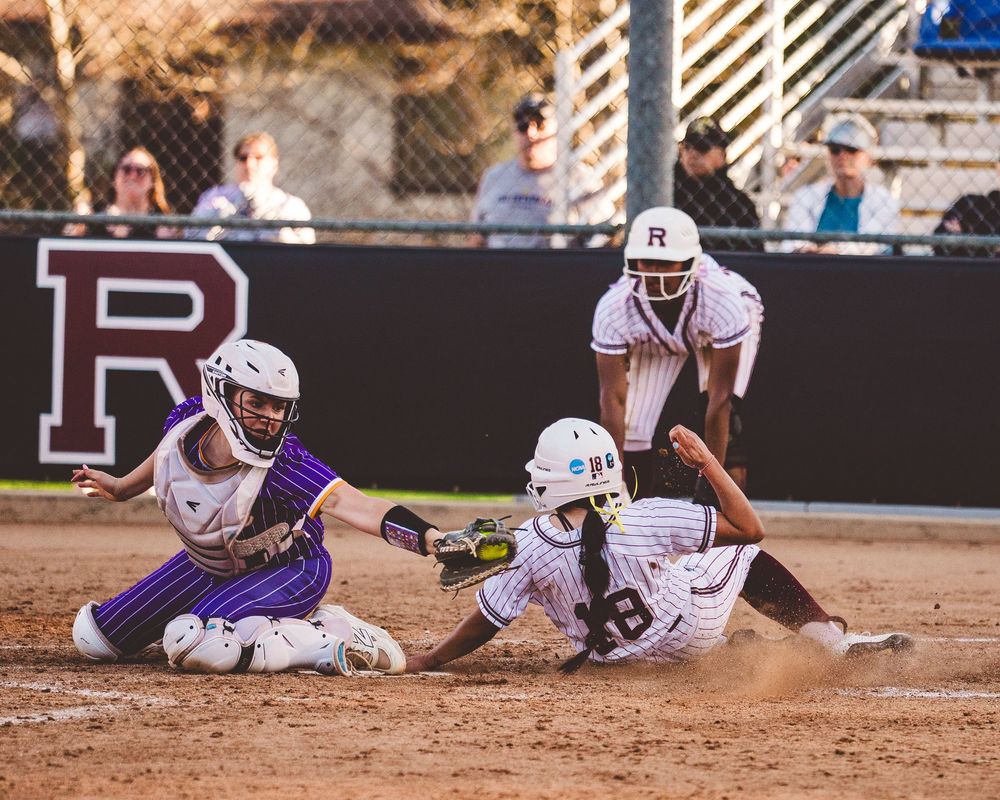 Baseball player slides into home plate during intense game action sequence showing multiple sliding attempts.