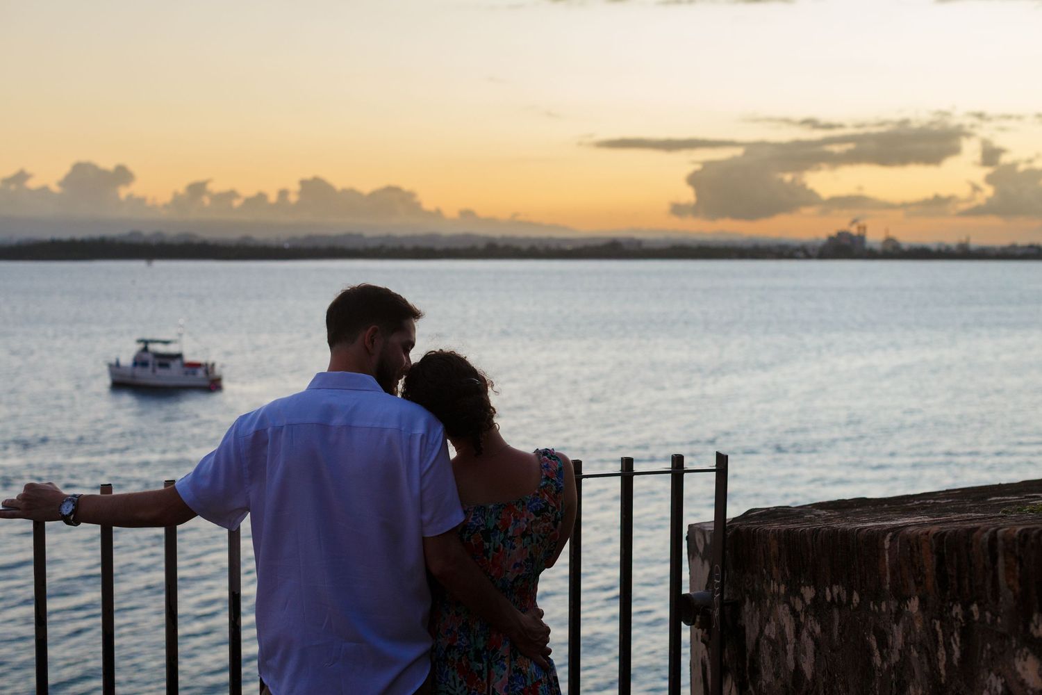 Couples portrait silhouette at sunset in Old San Juan, Puerto Rico.