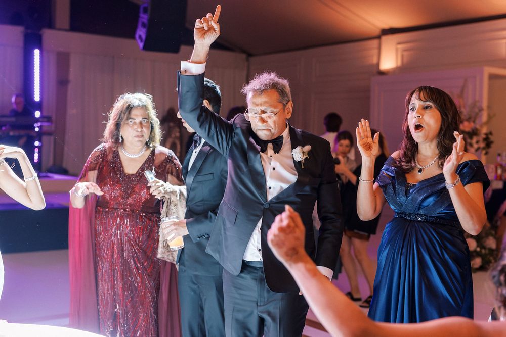 Emotional guests during cake cutting at Palácio do Correio-Mor wedding in Portugal