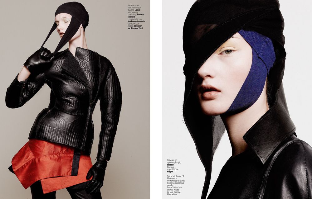 Fashion editorial featuring avant-garde styling with black leather top and red skirt alongside dramatic blue headpiece look.