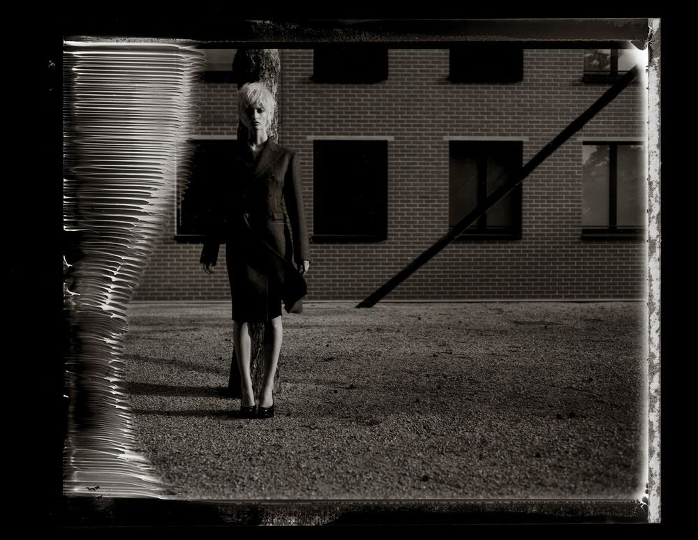 A series of vintage black and white photographs showing figures walking in an outdoor setting with dramatic shadows.