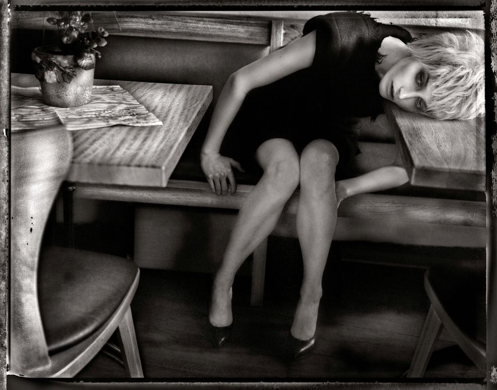 A black and white photo sequence shows someone's legs dangling from a bunk bed in different positions.