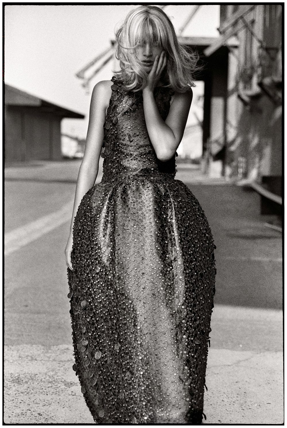 Black and white photo series showing a sparkly sequined dress from different angles on an outdoor street.