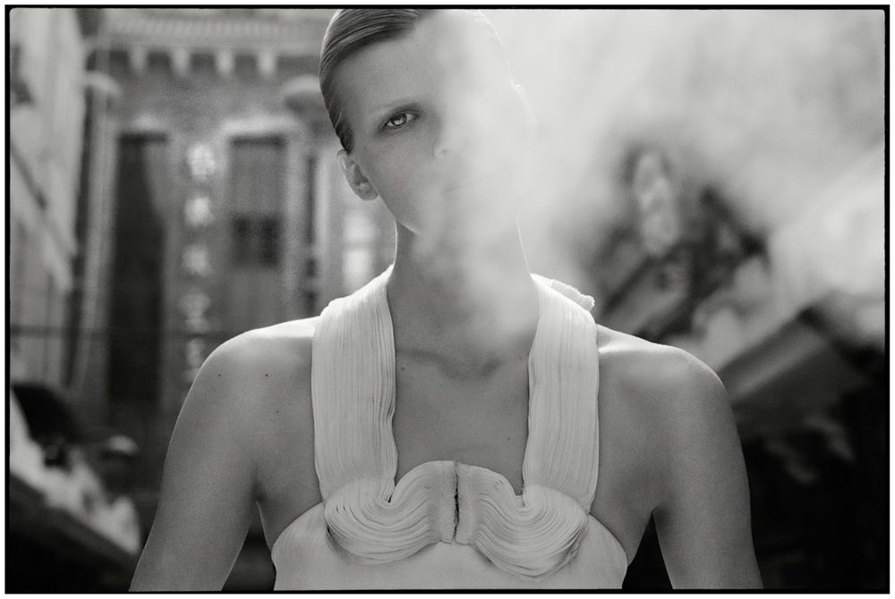 A black and white photo series showing close-up facial expressions and gestures in an artistic style.