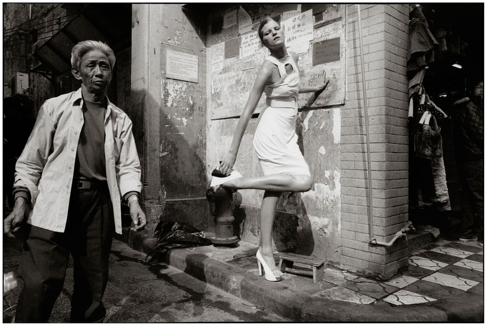 A series of vintage black and white photographs showing people in urban settings and street scenes from the past.