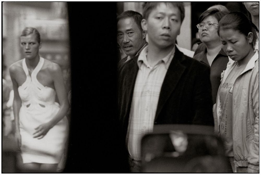 A series of black and white photographs showing people in formal attire at what appears to be a social gathering.