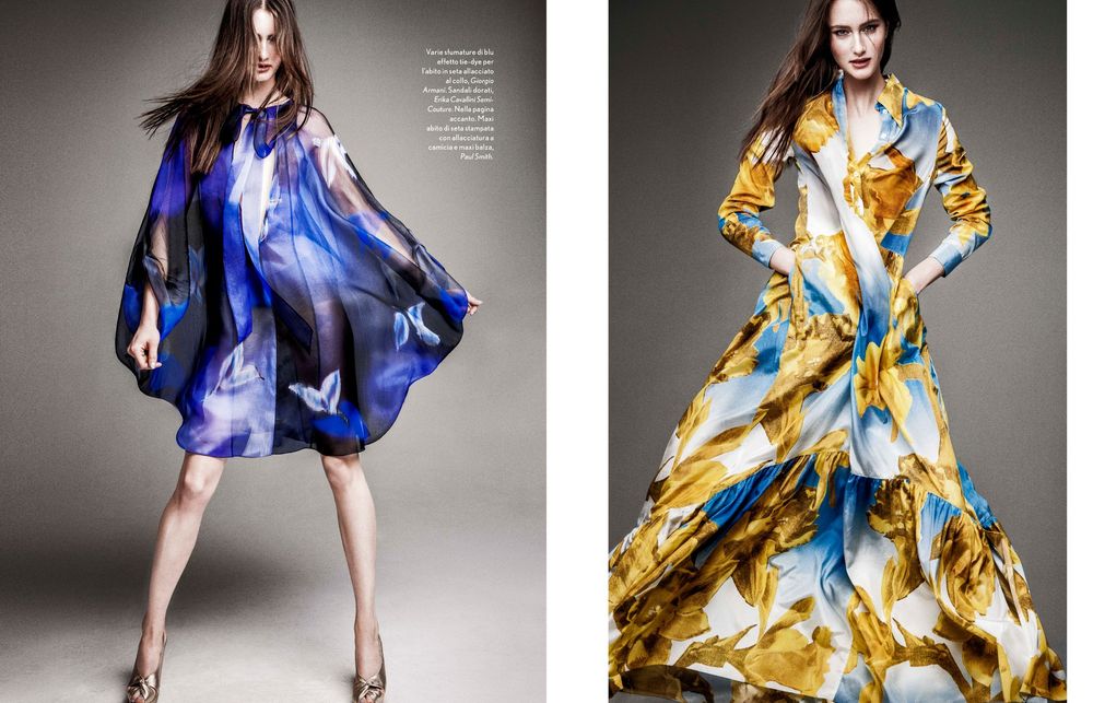 High fashion editorial series showcasing flowing silk dresses in vibrant blue and gold patterns with dramatic movement and poses.