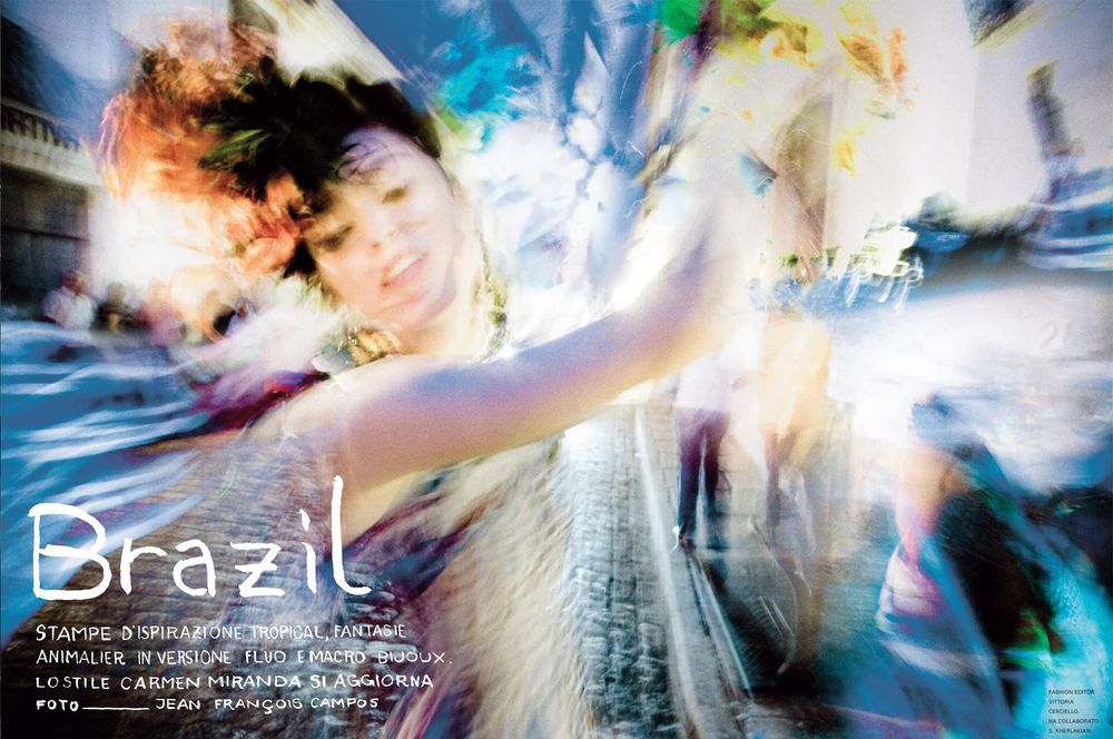 Artistic blurred motion photo with Brazil text overlay featuring dynamic street movement and bright light effects.