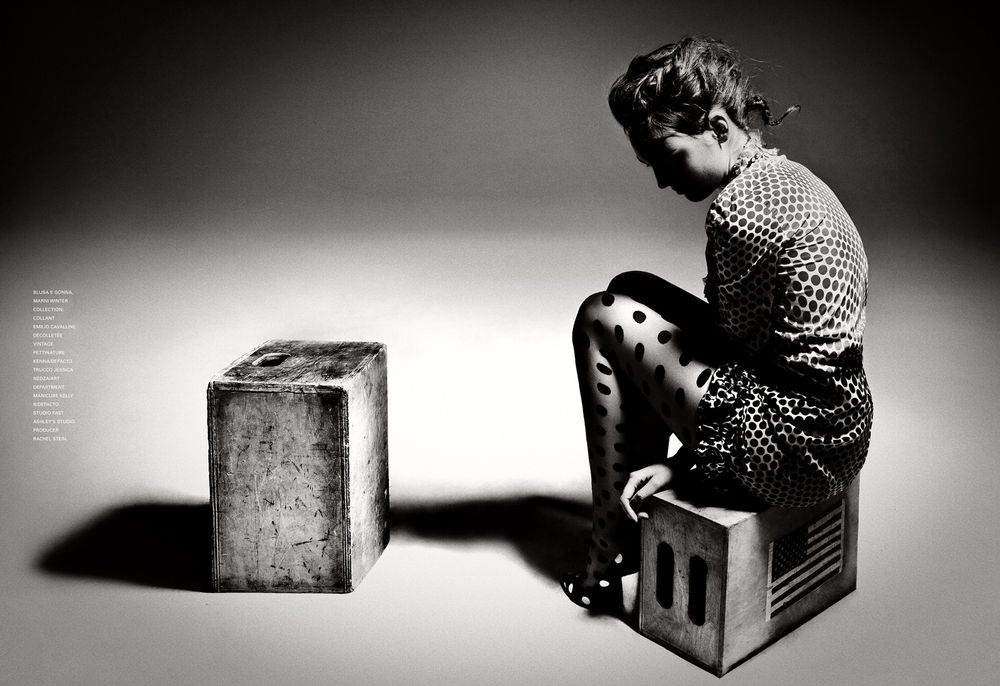 A series of black and white photographs showing a vintage box camera being disassembled step by step.