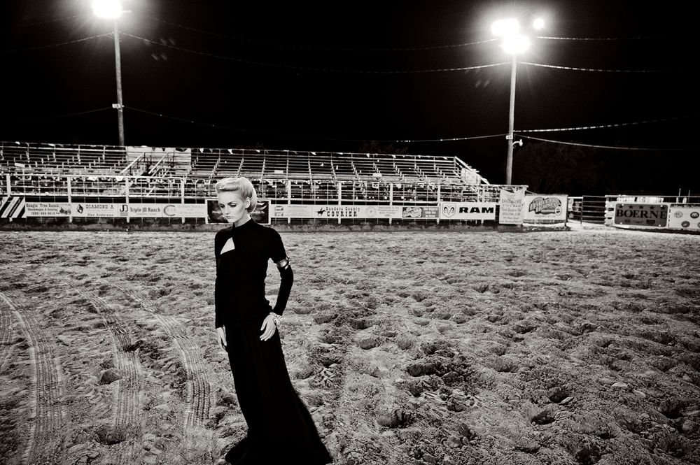 A series of black and white photos showing a goalkeeper making diving saves on a muddy soccer field at night.