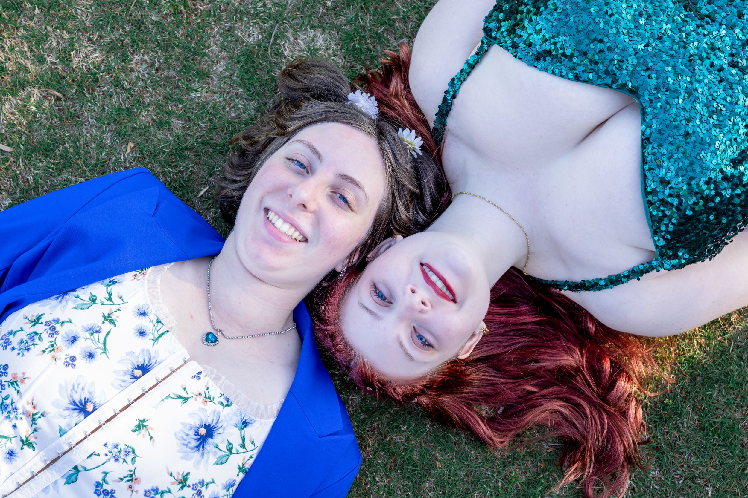 High school senior posing confidently in downtown Amherstburg. Sisters Portrait in Essex County. Graduation Photographer Windsor Ontario