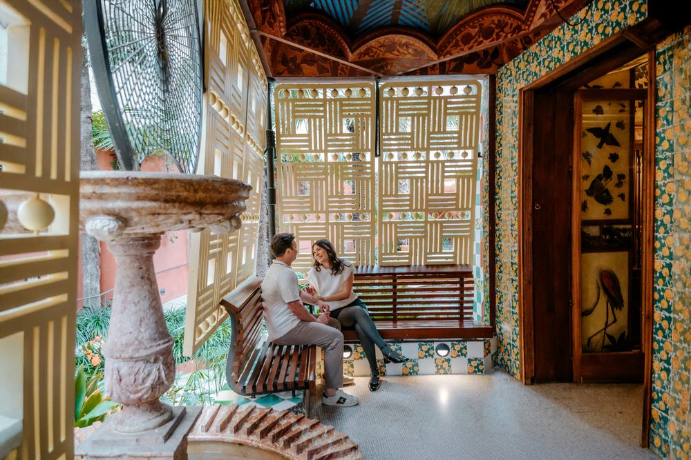 Couple hugging in Gaudí courtyard