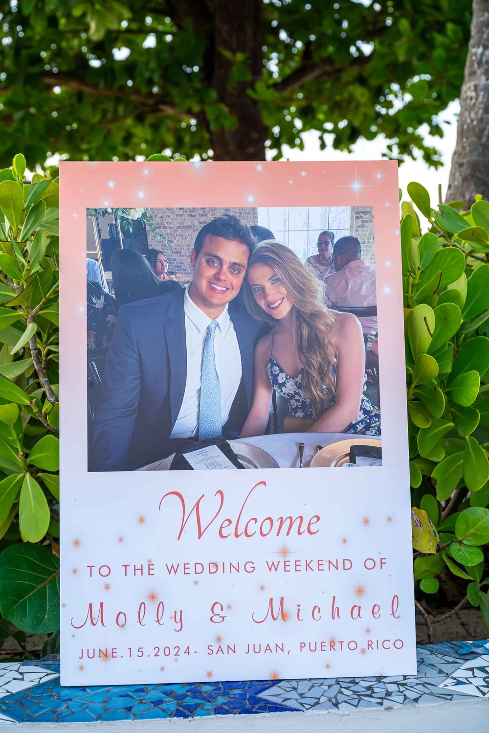 Wedding welcome sign for event in San Juan, Puerto Rico with decorative lettering.
