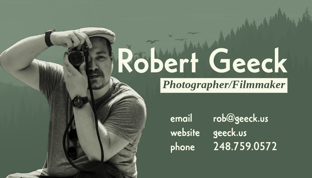 Professional black and white business card design for a photographer.