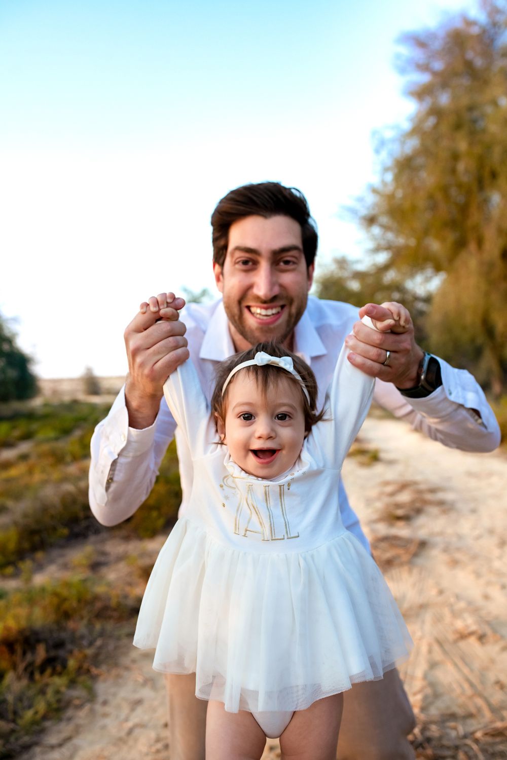 father and daughter photos dubai greenery
