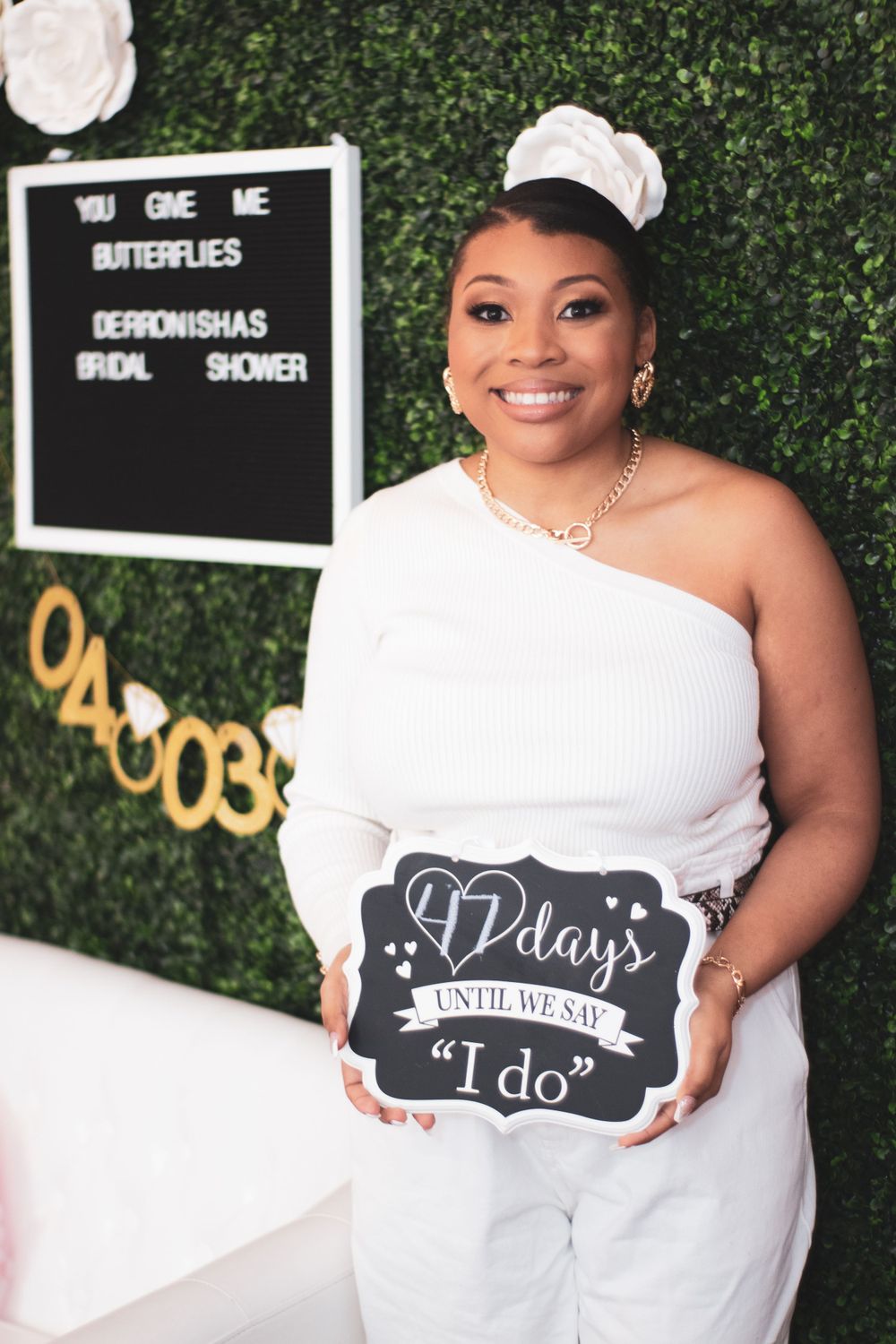 Bride-to-be posing in white dress