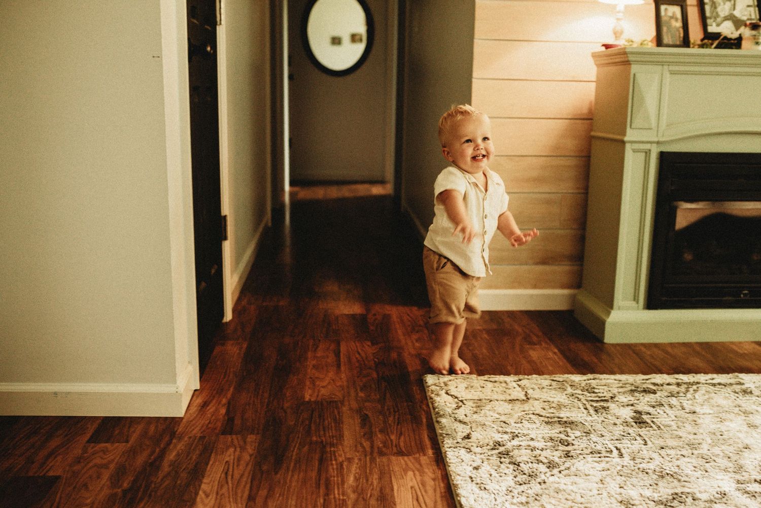 Boy running down the hallway with joy