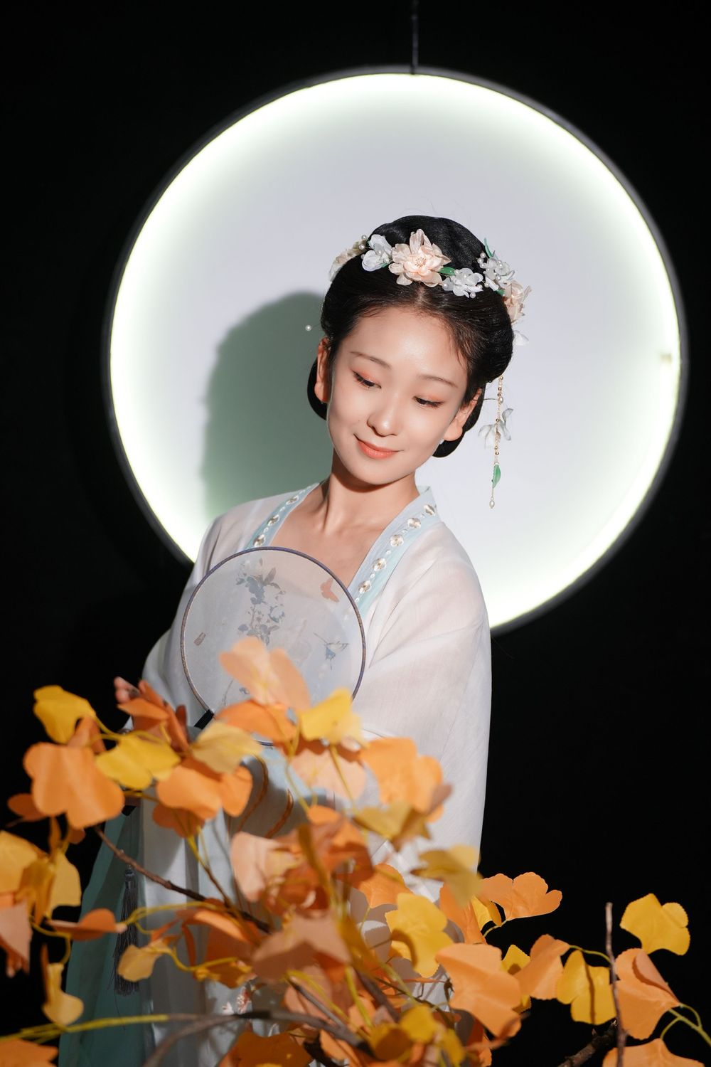 Elegant Mid-Autumn Moon Festival event portrait featuring traditional Hanfu and floral styling, by an Auckland event photographer.
