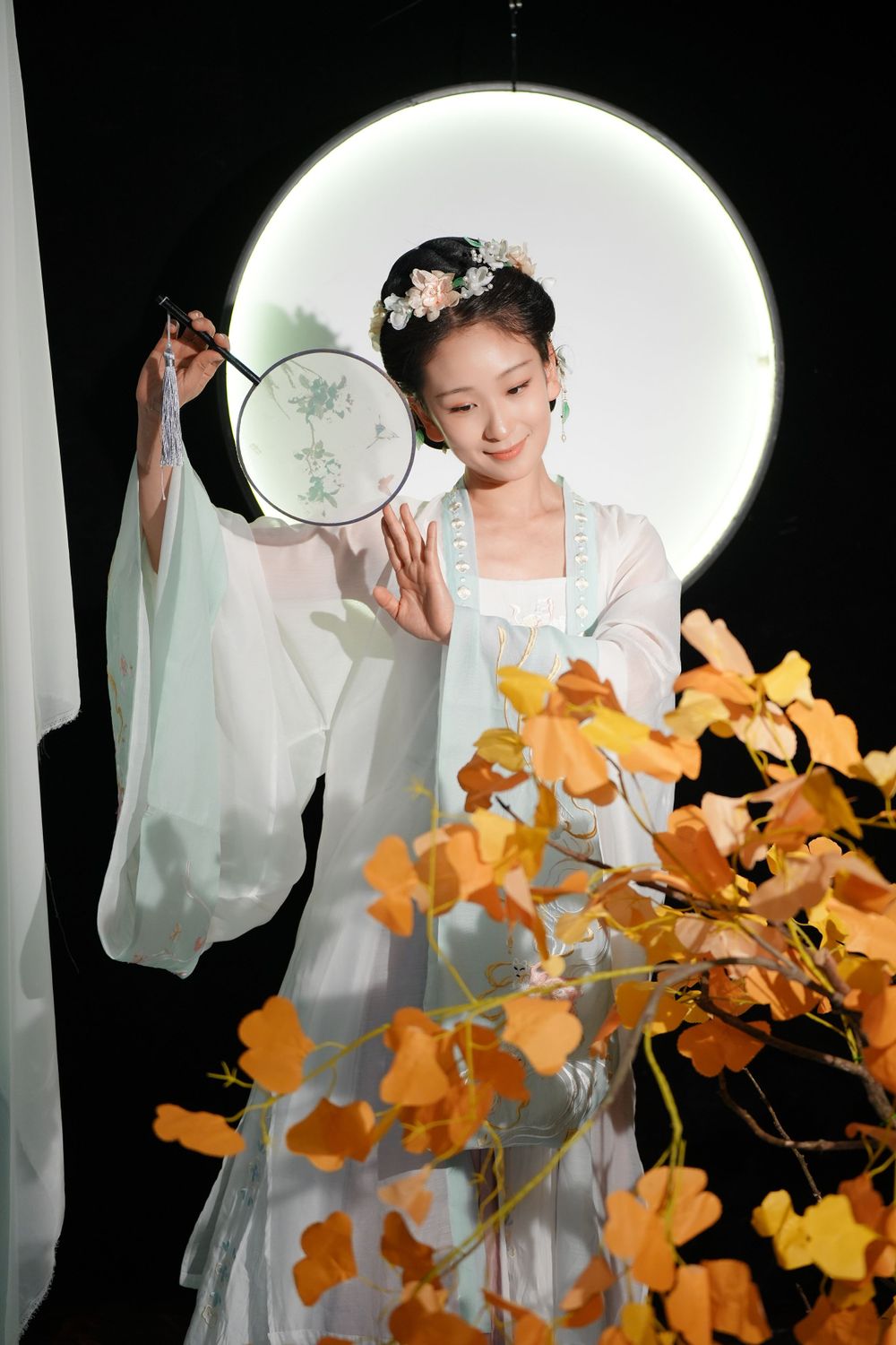 Elegant Mid-Autumn Moon Festival event portrait featuring traditional Hanfu and floral styling, by an Auckland event photographer.