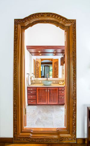 Entrance: "Stunning solid wood entrance with artistic details in a luxury home in Atenas, Costa Rica. A symbol of welcome