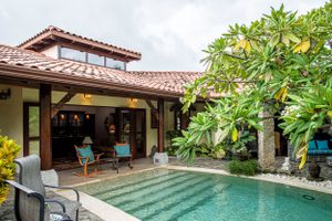 Extensive tropical garden with fruit trees and exotic flowers in a country house in Atenas, Costa Rica. An oasis of peace