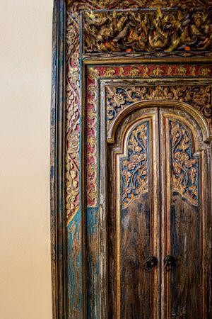 Intricate carvings on a traditional wooden door, a stunning feature in Costa Rican architecture