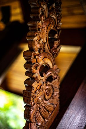 Close-up of an ornate wooden design, showcasing the artistry in architectural details